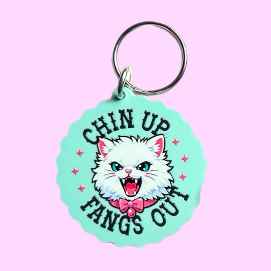 Chin Up Fangs Out Cat Keychain (Teal)
