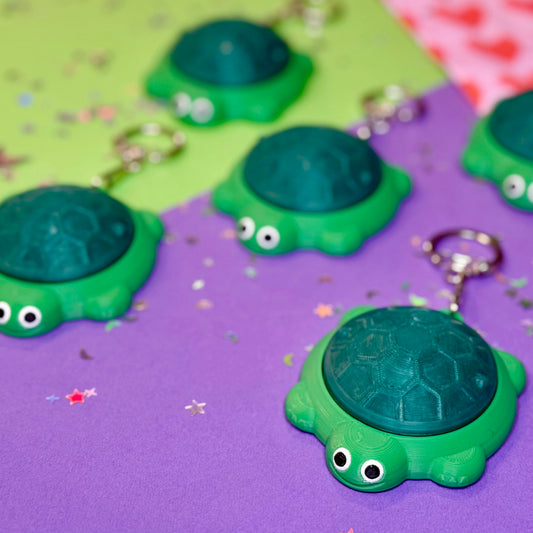 Turtle Sandbox Fidget Clicker Keychain